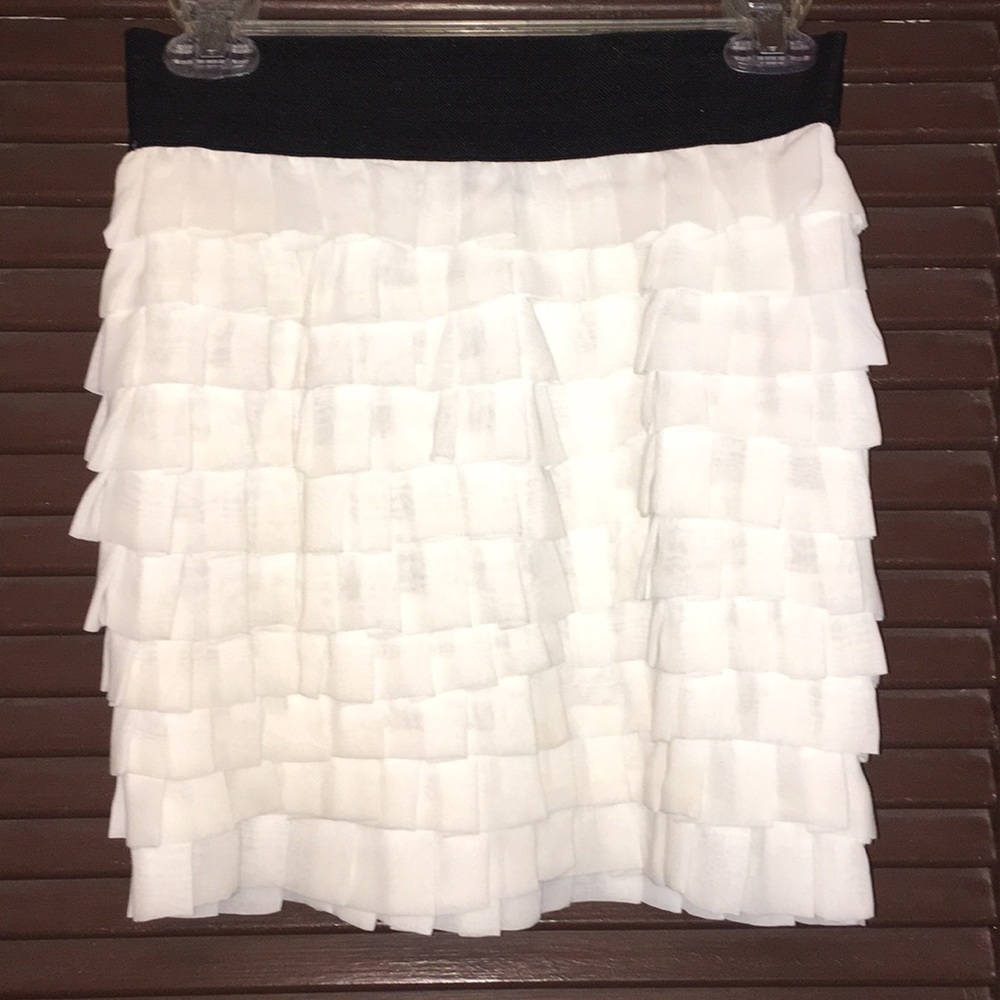 White ruffled skirt